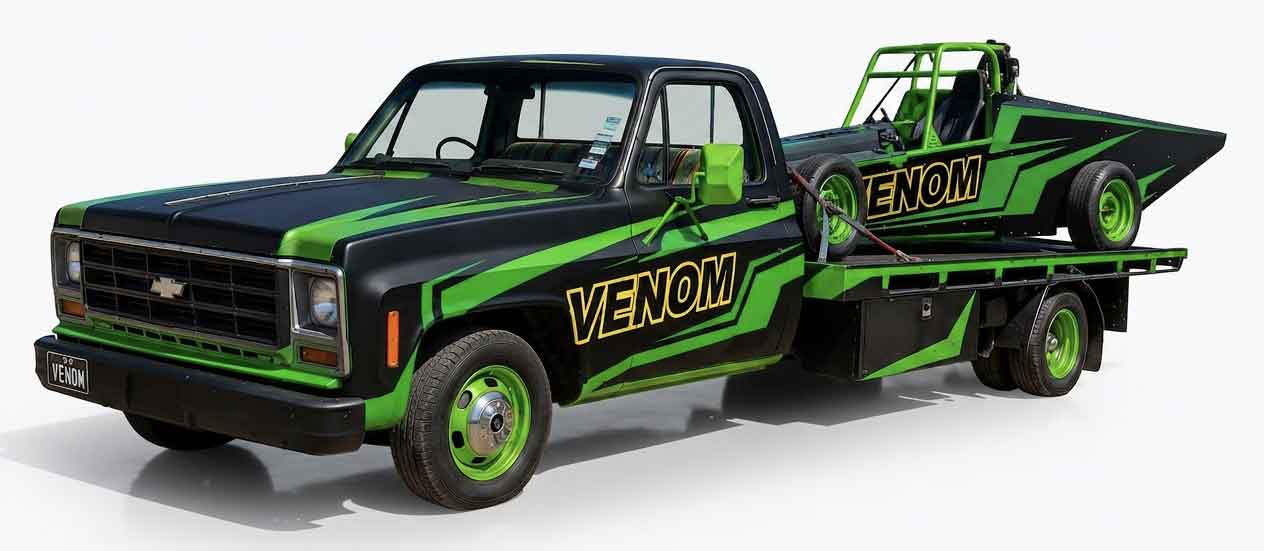 venom on race transporter chevrolet C30 square body truck. Both vehicles matching in satin black with green race stripes.